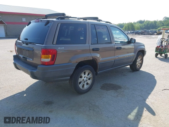2001 Jeep Grand Cherokee Laredo with VIN 1J4GW48S31C626727, listed as a IAAI auction lot 42796974 with 132,988 mi miles and . Bid and sale history available at DreamBid. Image 4.