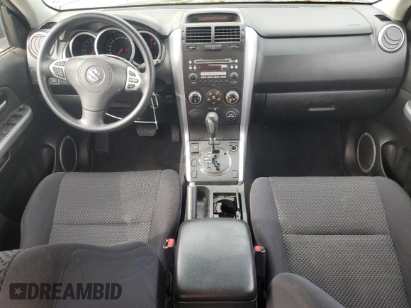2007 Suzuki Grand Vitara with VIN JS3TE941474202110, listed as a Copart auction lot 52110865 with 132,661 mi miles and Salvage title. Bid and sale history available at DreamBid. Image 8.