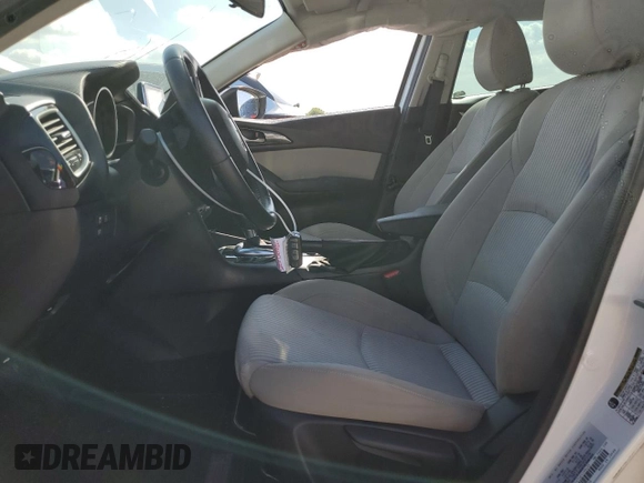 2014 Mazda 3 i Touring z VIN JM1BM1V74E1199435, wystawiony jako Copart lot #80288274 z przebiegiem 148 000 mil mil oraz Szkoda całkowita • Salvage title. Historia ofert i sprzedaży dostępna na DreamBid. Obrazek 7.