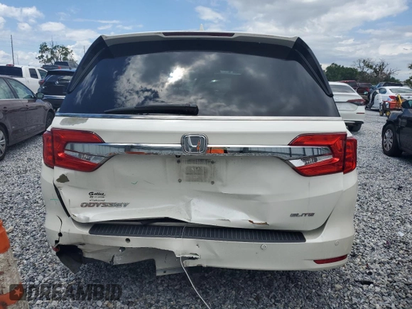 2018 Honda Odyssey Elite z VIN 5FNRL6H9XJB064148, wystawiony jako Copart lot #56214025 z przebiegiem 117 627 mil mil oraz Szkoda całkowita • Salvage title. Historia ofert i sprzedaży dostępna na DreamBid. Obrazek 6.