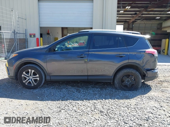 2016 Toyota RAV4 LE with VIN JTMZFREV5GJ078051, listed as a IAAI auction lot 41858381 with 97,032 mi miles and . Bid and sale history available at DreamBid. Image 14.