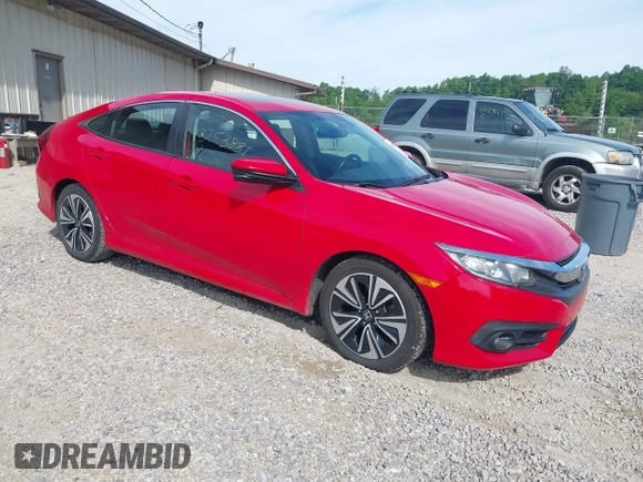2016 Honda Civic EX-L z VIN 2HGFC1F74GH652090, wystawiony jako IAAI lot #42253881 z przebiegiem 127 863 mil mil oraz . Historia ofert i sprzedaży dostępna na DreamBid. Obrazek 1.