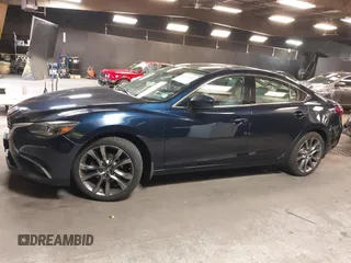 2017 Mazda 6 Grand Touring with VIN JM1GL1W51H1101519, listed as a IAAI auction lot 42132215 with 145,796 mi miles. Bid and sale history available at carsss.com. Image 14.