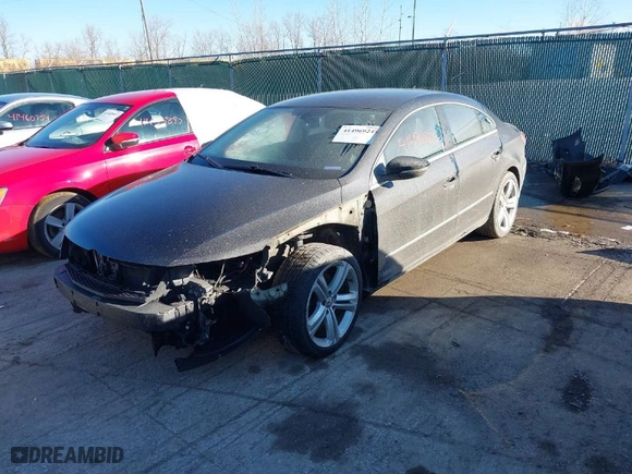 2013 Volkswagen CC Sport with VIN WVWBN7AN2DE524143, listed as a IAAI auction lot 41496924 with 121,372 mi miles. Bid and sale history available at carsss.com. Image 2.