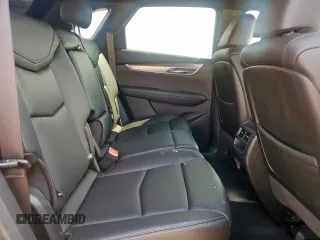 2021 Cadillac XT5 AWD Luxury z VIN 1GYKNBR44MZ162883, wystawiony jako Copart lot #59623725 z przebiegiem 50 006 mil mil oraz Szkoda całkowita • Salvage title. Historia ofert i sprzedaży dostępna na DreamBid. Obrazek 11.