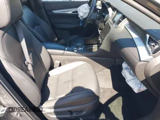 2021 Infiniti QX50 Luxe z VIN 3PCAJ5BA2MF111323, wystawiony jako IAAI lot #42218711 z przebiegiem 27 864 mil mil oraz . Historia ofert i sprzedaży dostępna na DreamBid. Obrazek 5.