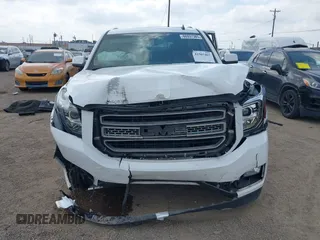 2015 GMC Yukon SLT with VIN 1GKS1BKC6FR109970, listed as a IAAI auction lot 41507467 with 115,309 mi miles. Bid and sale history available at carsss.com. Image 13.