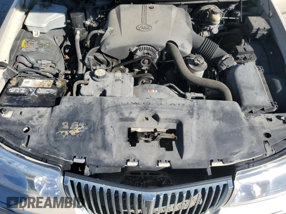 2001 Lincoln Town Car Cartier z VIN 1LNHM83W31Y671814, wystawiony jako Copart lot #77169664 z przebiegiem Nie podano mil oraz Szkoda całkowita • Salvage title. Historia ofert i sprzedaży dostępna na DreamBid. Obrazek 11.