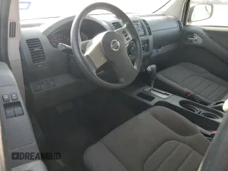 2010 Nissan Frontier XE with VIN 1N6BD0CT1AC427994, listed as a Copart auction lot 71574484 with 121,102 mi miles and Salvage title. Bid and sale history available at DreamBid. Image 8.