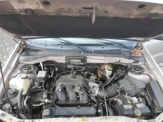 2001 Ford Escape XLS with VIN 1FMYU02111KA37010, listed as a Copart auction lot 52328415 with 312,425 mi miles and Salvage title. Bid and sale history available at DreamBid. Image 12.