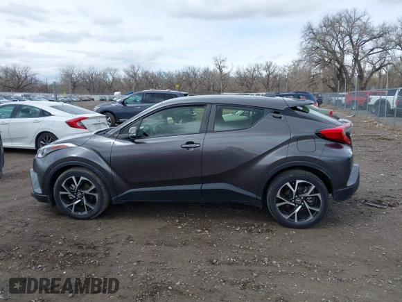 2019 Toyota C-HR XLE with VIN JTNKHMBX6K1055144, listed as a IAAI auction lot 41937836 with 8,299 mi miles. Bid and sale history available at carsss.com. Image 14.