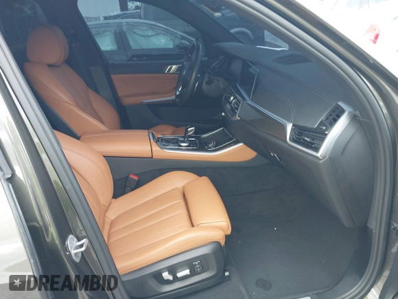2022 BMW X5 xDrive45e z VIN 5UXTA6C00N9L06383, wystawiony jako IAAI lot #38552162 z przebiegiem 19 592 mil mil oraz . Historia ofert i sprzedaży dostępna na DreamBid. Obrazek 5.