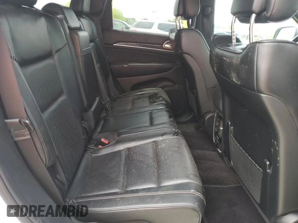 2017 Jeep Grand Cherokee Overland with VIN 1C4RJFCGXHC823593, listed as a Copart auction lot 58727205 with Not provided miles and Salvage title. Bid and sale history available at DreamBid. Image 11.