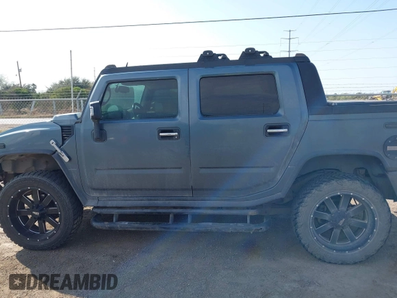 2006 Hummer H2 with VIN 5GRGN22U06H103326, listed as a IAAI auction lot 41474829 with 217,436 mi miles. Bid and sale history available at carsss.com. Image 14.