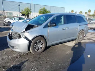 2011 Honda Odyssey EX-L with VIN 5FNRL5H6XBB057556, listed as a IAAI auction lot 41808620 with 154,449 mi miles. Bid and sale history available at carsss.com. Image 17.