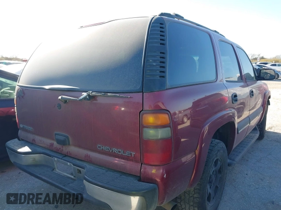 2004 Chevrolet Tahoe LT z VIN 1GNEC13ZX4R166600, wystawiony jako IAAI lot #41728301 z przebiegiem 245 044 mil mil oraz . Historia ofert i sprzedaży dostępna na DreamBid. Obrazek 4.