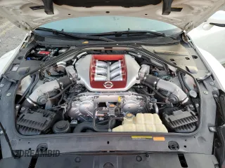 2012 Nissan GT-R Premium z VIN JN1AR5EF3CM251325, wystawiony jako Copart lot #77342524 z przebiegiem 70 923 mil mil oraz Szkoda całkowita • Salvage title. Historia ofert i sprzedaży dostępna na DreamBid. Obrazek 11.