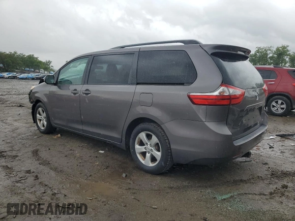 2015 Toyota Sienna LE AAS with VIN 5TDKK3DC3FS572405, listed as a Copart auction lot 58141975 with 146,820 mi miles and Salvage title. Bid and sale history available at DreamBid. Image 2.