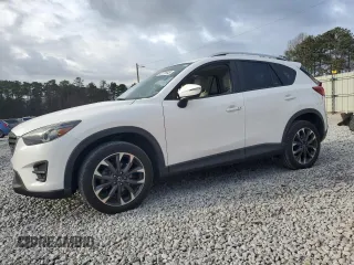 2016 Mazda CX-5 Grand Touring with VIN JM3KE2DY6G0786927, listed as a Copart auction lot 51668495 with 132,736 mi miles and Salvage Title. Bid and sale history available at carsss.com. Image 1.