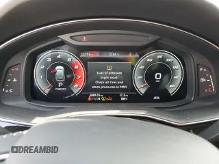 2021 Audi Q8 Premium z VIN WA1AVAF15MD020653, wystawiony jako Copart lot #55220895 z przebiegiem 68 826 mil mil oraz Tytuł czysty. Historia ofert i sprzedaży dostępna na DreamBid. Obrazek 9.