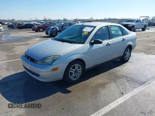 2004 Ford Focus SE with VIN 1FAFP34394W120884, listed as a IAAI auction lot 41663180 with 213,972 mi miles and . Bid and sale history available at DreamBid. Image 17.
