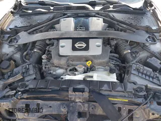 2009 Nissan 370Z z VIN JN1AZ44E19M405896, wystawiony jako IAAI lot #41889553 z przebiegiem 202 388 mil mil oraz . Historia ofert i sprzedaży dostępna na DreamBid. Obrazek 10.