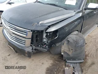 2015 Chevrolet Suburban LTZ with VIN 1GNSKKKC6FR637086, listed as a IAAI auction lot 42104826 with 79,986 mi miles and . Bid and sale history available at DreamBid. Image 6.