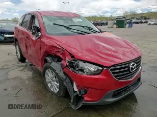 2016 Mazda CX-5 Touring with VIN JM3KE4CYXG0680266, listed as a Copart auction lot 55215755 with Not Provided miles and Non Repairable. Bid and sale history available at carsss.com. Image 14.
