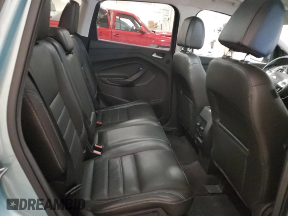 2013 Ford Escape SEL with VIN 1FMCU9H93DUA72099, listed as a Copart auction lot 58691955 with 30,449 mi miles and Salvage title. Bid and sale history available at DreamBid. Image 11.