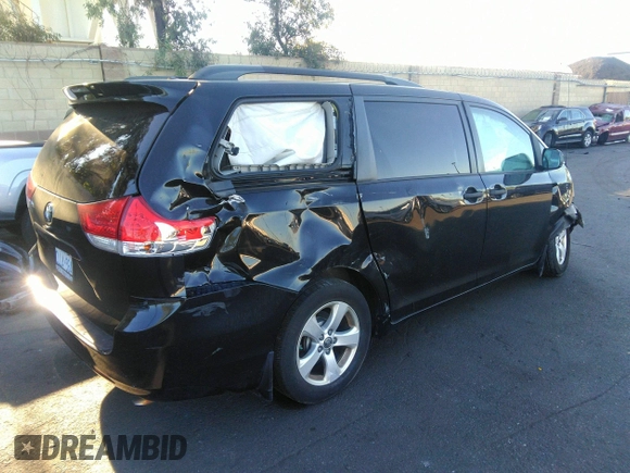 2014 Toyota Sienna L with VIN 5TDZK3DC2ES449563, listed as a IAAI auction lot 37355441 with 246,582 mi miles and . Bid and sale history available at DreamBid. Image 4.