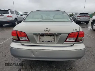 2004 Infiniti I35 z VIN JNKDA31A94T210932, wystawiony jako Copart lot #58418925 z przebiegiem 55 893 mil mil oraz Tytuł czysty. Historia ofert i sprzedaży dostępna na DreamBid. Obrazek 6.