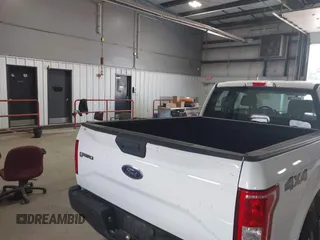 2015 Ford F-150 XLT with VIN 1FTFX1EF3FKD59476, listed as a IAAI auction lot 42622270 with 201,039 mi miles and . Bid and sale history available at DreamBid. Image 16.