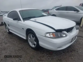 1996 Ford Mustang GT z VIN 1FALP42X4TF229346, wystawiony jako IAAI lot #42225102 z przebiegiem 151 275 mil mil oraz . Historia ofert i sprzedaży dostępna na DreamBid. Obrazek 1.