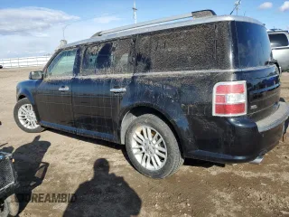 2015 Ford Flex SEL with VIN 2FMHK6C85FBA21138, listed as a Copart auction lot 50011725 with 115,897 mi miles and Salvage Title. Bid and sale history available at carsss.com. Image 2.