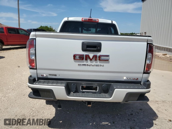2022 GMC Canyon 4WD AT4 with VIN 1GTG6FEN2N1210072, listed as a Copart auction lot 53247005 with 64,897 mi miles and Salvage Title. Bid and sale history available at carsss.com. Image 6.