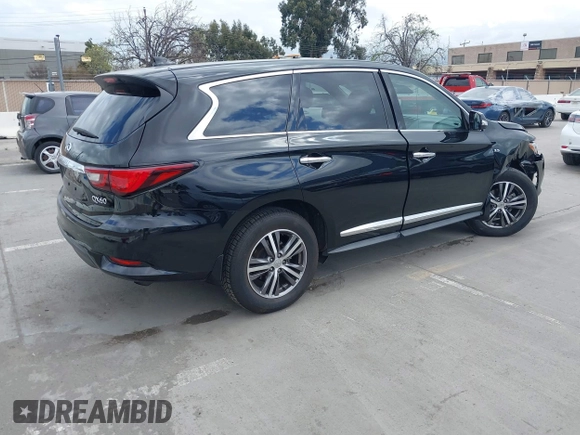 2020 Infiniti QX60 LUXE with VIN 5N1DL0MM5LC540433, listed as a IAAI auction lot 41894992 with 70,034 mi miles. Bid and sale history available at carsss.com. Image 4.