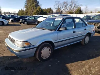 1991 Toyota Corolla z VIN JT2AE94A4M3451152, wystawiony jako Copart lot #45515795 z przebiegiem 166 656 mil mil oraz Szkoda całkowita • Salvage title. Historia ofert i sprzedaży dostępna na DreamBid. Obrazek 1.