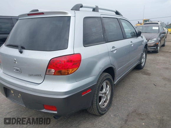 2004 Mitsubishi Outlander LS with VIN JA4LX31F04U038009, listed as a IAAI auction lot 41616254 with 219,527 mi miles. Bid and sale history available at carsss.com. Image 4.