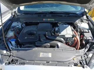2015 Ford Fusion SE Hybrid with VIN 3FA6P0LUXFR296373, listed as a IAAI auction lot 42600980 with 76,985 mi miles and . Bid and sale history available at DreamBid. Image 10.