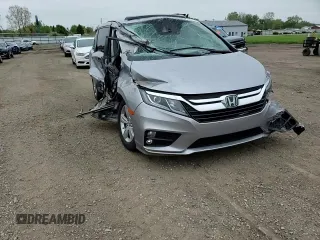 2019 Honda Odyssey EX-L z VIN 5FNRL6H7XKB049729, wystawiony jako Copart lot #55953075 z przebiegiem 129 194 mil mil oraz Szkoda całkowita • Salvage title. Historia ofert i sprzedaży dostępna na DreamBid. Obrazek 14.