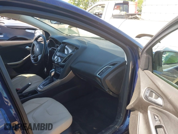 2016 Ford Focus Titanium with VIN 1FADP3N23GL231613, listed as a IAAI auction lot 42645683 with 76,072 mi miles and . Bid and sale history available at DreamBid. Image 5.