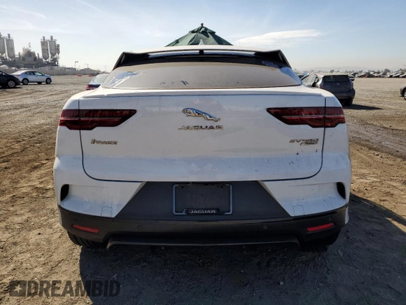 2019 Jaguar I-Pace SE z VIN SADHC2S19K1F68022, wystawiony jako Copart lot #77405114 z przebiegiem Nie podano mil oraz Szkoda całkowita • Salvage title. Historia ofert i sprzedaży dostępna na DreamBid. Obrazek 6.