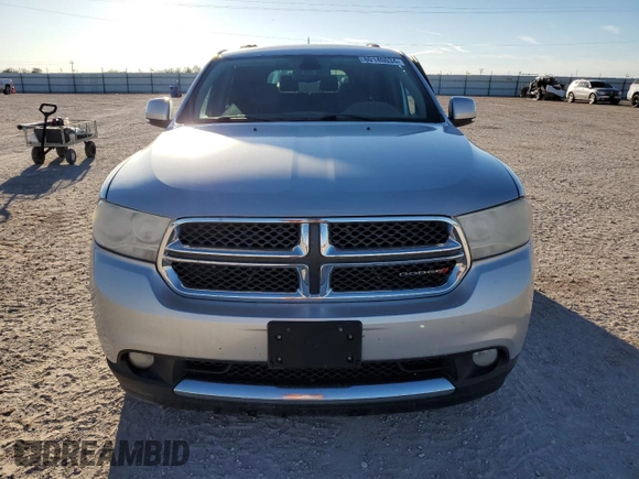 2013 Dodge Durango Crew with VIN 1C4SDHDT0DC590172, listed as a Copart auction lot 80140034 with 135,078 mi miles and Salvage title. Bid and sale history available at DreamBid. Image 5.
