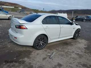2017 Mitsubishi Lancer ES with VIN JA32V2FW0HU014887, listed as a IAAI auction lot 41056278 with 108,385 mi miles. Bid and sale history available at carsss.com. Image 4.