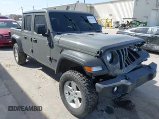 2020 Jeep Gladiator Sport S z VIN 1C6HJTAG7LL154664, wystawiony jako IAAI lot #42033131 z przebiegiem 73 282 mil mil oraz . Historia ofert i sprzedaży dostępna na DreamBid. Obrazek 1.