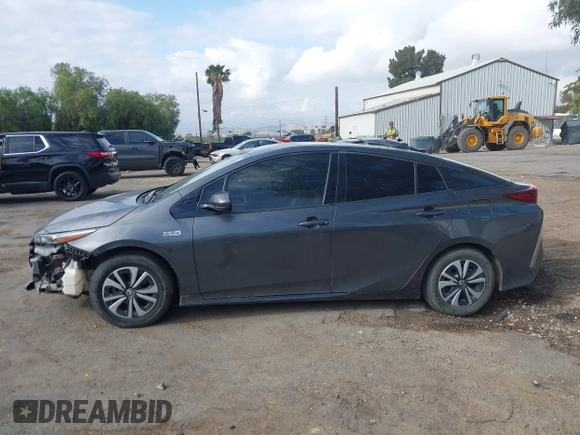 2018 Toyota Prius Plus with VIN JTDKARFPXJ3104302, listed as a IAAI auction lot 42127312 with 87,531 mi miles and . Bid and sale history available at DreamBid. Image 15.