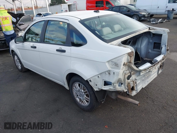 2010 Ford Focus SE with VIN 1FAHP3FN5AW146403, listed as a IAAI auction lot 40955575 with 128,243 mi miles. Bid and sale history available at carsss.com. Image 3.