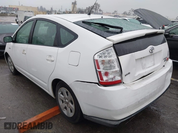 2007 Toyota Prius z VIN JTDKB20U177622142, wystawiony jako IAAI lot #41720920 z przebiegiem 140 665 mil mil oraz . Historia ofert i sprzedaży dostępna na DreamBid. Obrazek 3.