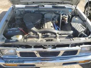 1996 Nissan Frontier XE z VIN 1N6SD11Y5TC327761, wystawiony jako Copart lot #79662594 z przebiegiem 151 631 mil mil oraz Szkoda całkowita • Salvage title. Historia ofert i sprzedaży dostępna na DreamBid. Obrazek 11.
