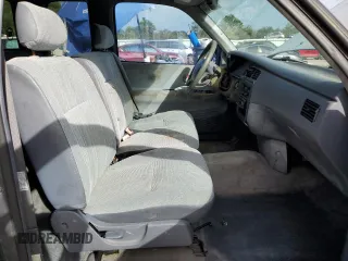 1997 Toyota T100 DX z VIN JT4TN12D3V0036552, wystawiony jako Copart lot #77829724 z przebiegiem 230 069 mil mil oraz Czysty tytuł • Clean title. Historia ofert i sprzedaży dostępna na DreamBid. Obrazek 7.